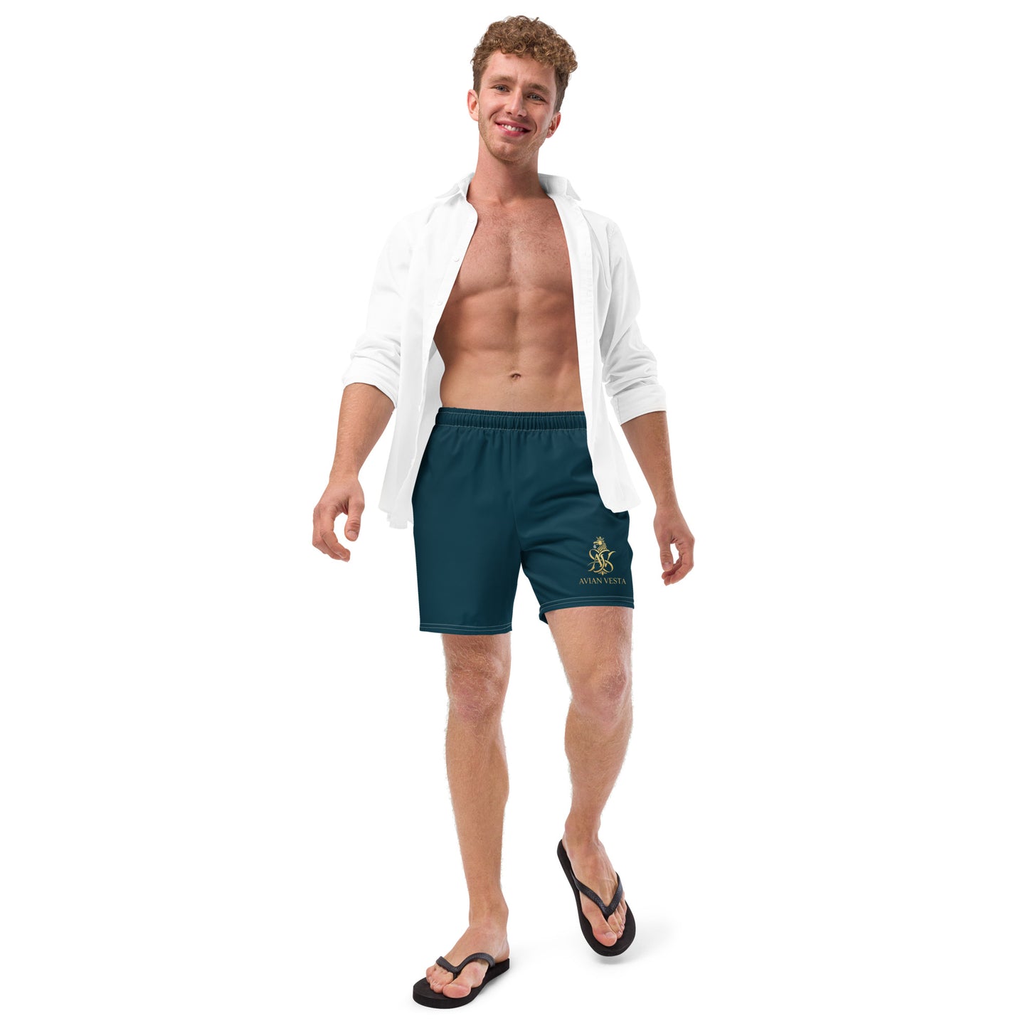 Model wearing Blue Whale signature swim trunks styled for beach wear