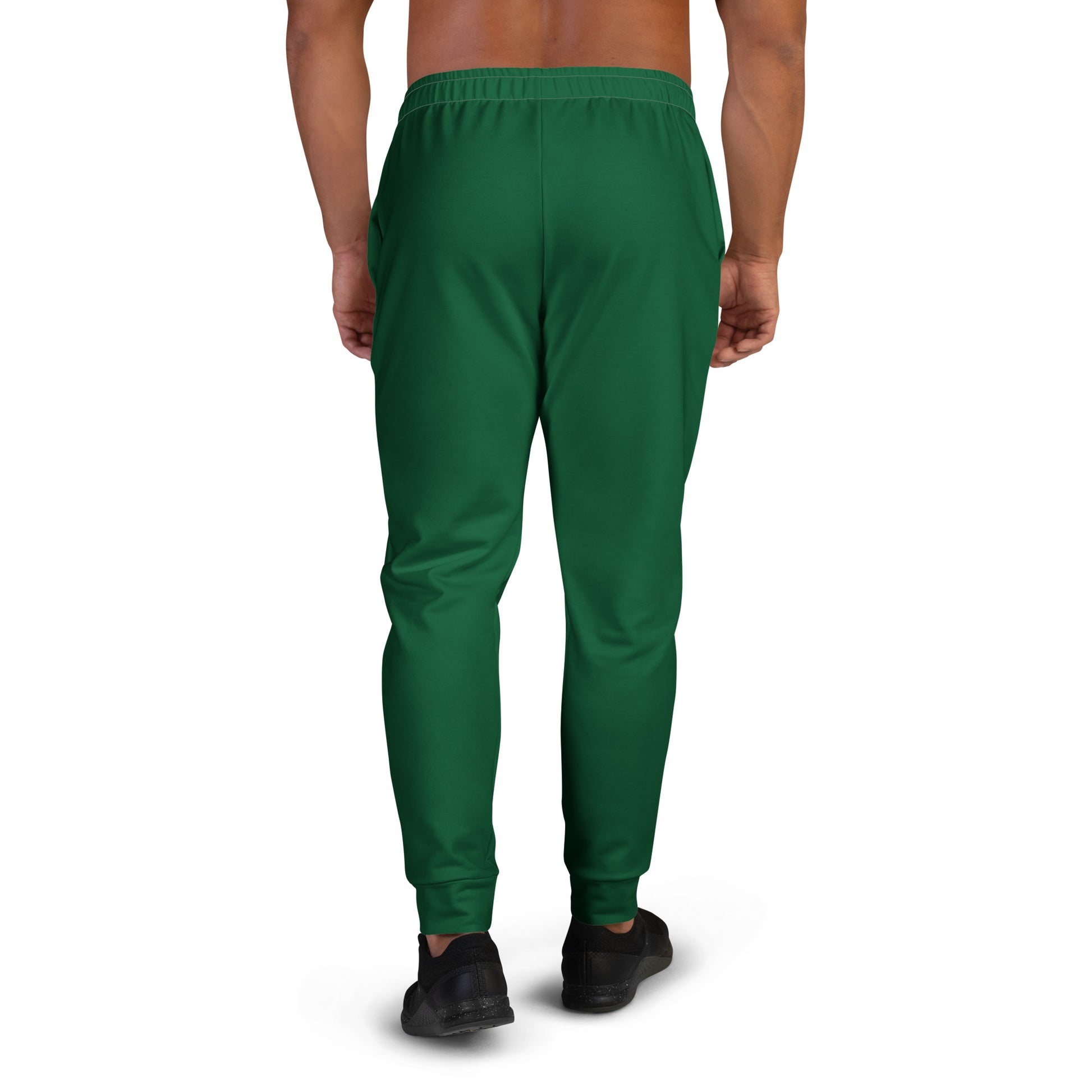 “Back view of Avian Vesta Signature Evergreen joggers with gold crest detailing.”