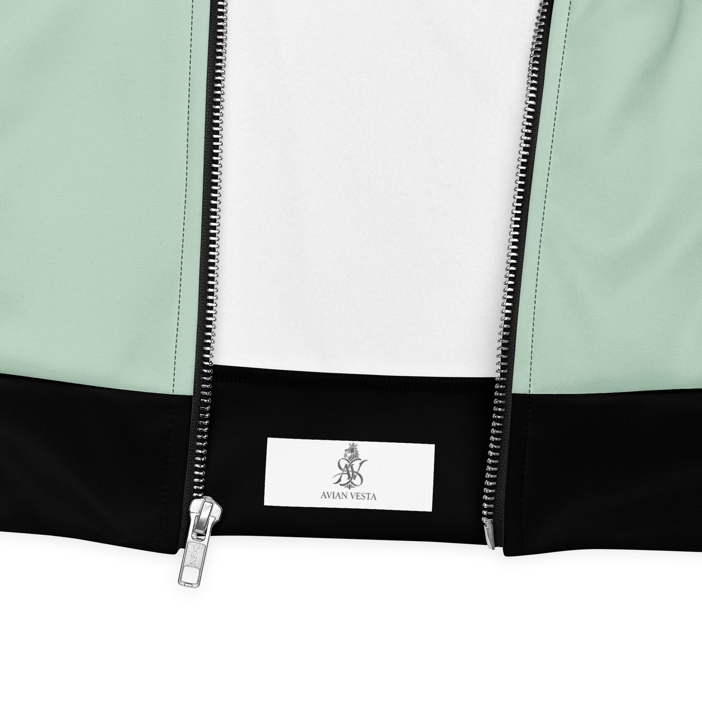 Close-up detail of Avian Vesta Signature Edgewater Bomber zipper and branded hem label
