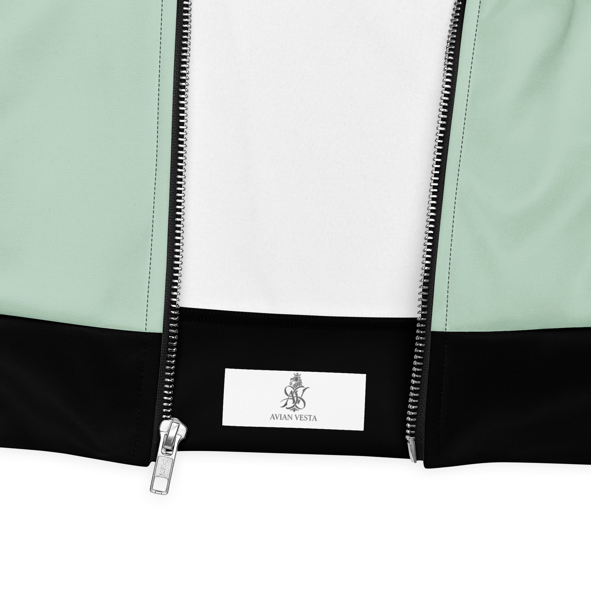 Close-up detail of Avian Vesta Signature Edgewater Bomber zipper and branded hem label